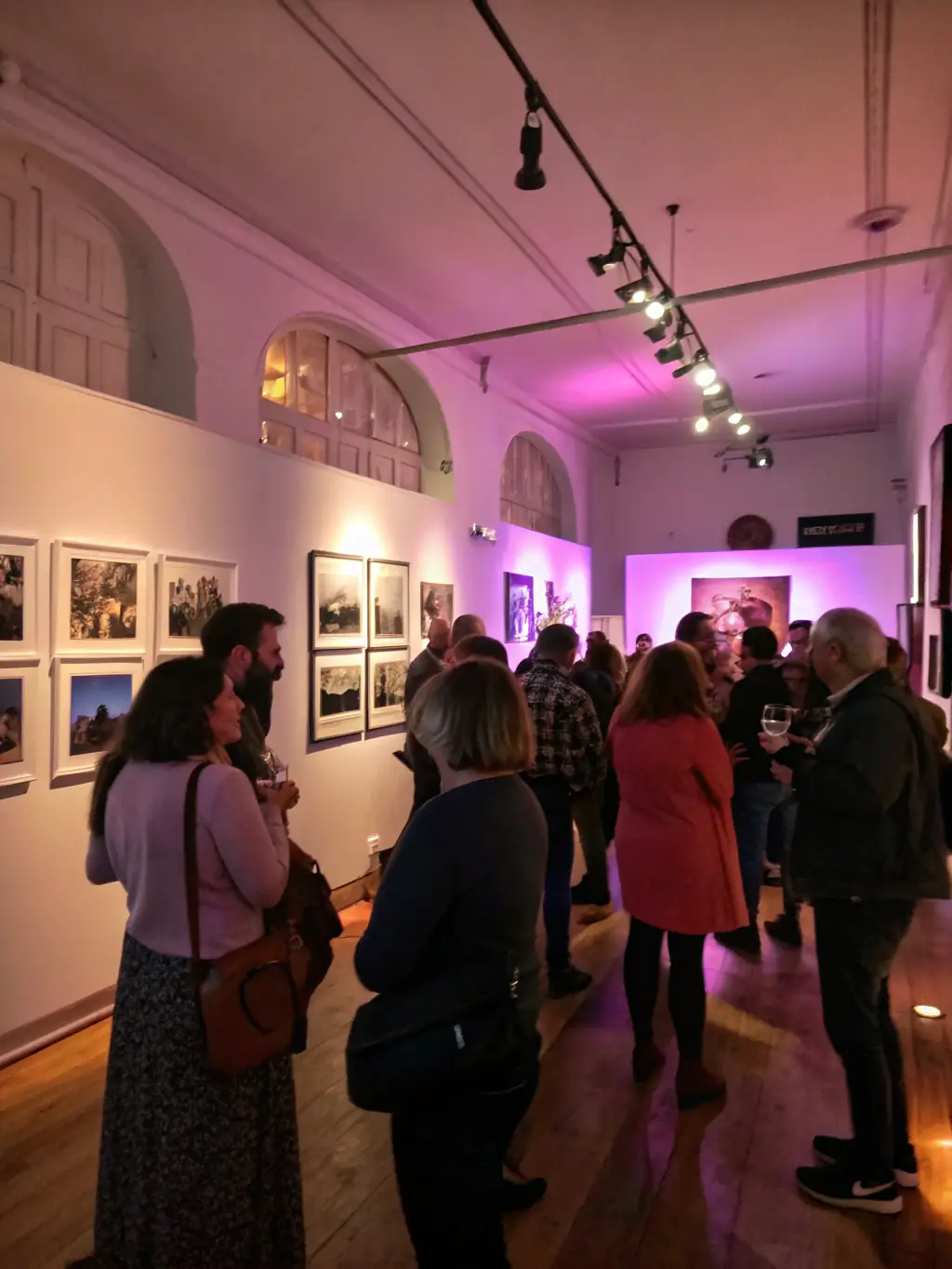 A photograph capturing the opening night of a recent SAMHA-organized exhibition at the Musée de la Haute Auvergne, showcasing artifacts and attendees.